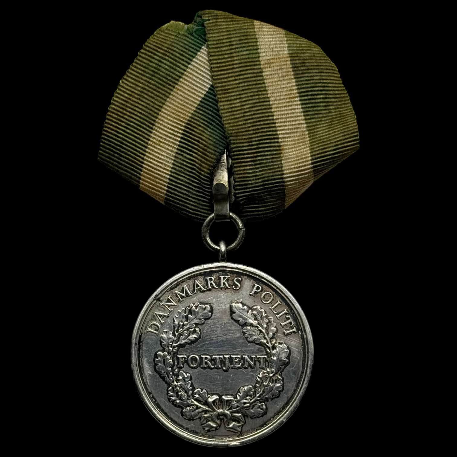 Fortjeneste medalje for 25 års tro tjeneste, fra Politiet, med org. bånd