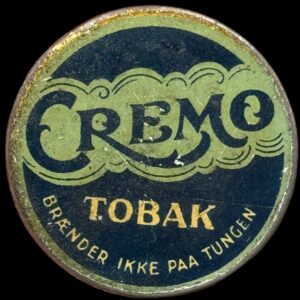 Postskillemønt, 25 øre CREMO, Rød baggrund, Kva. 1+-01