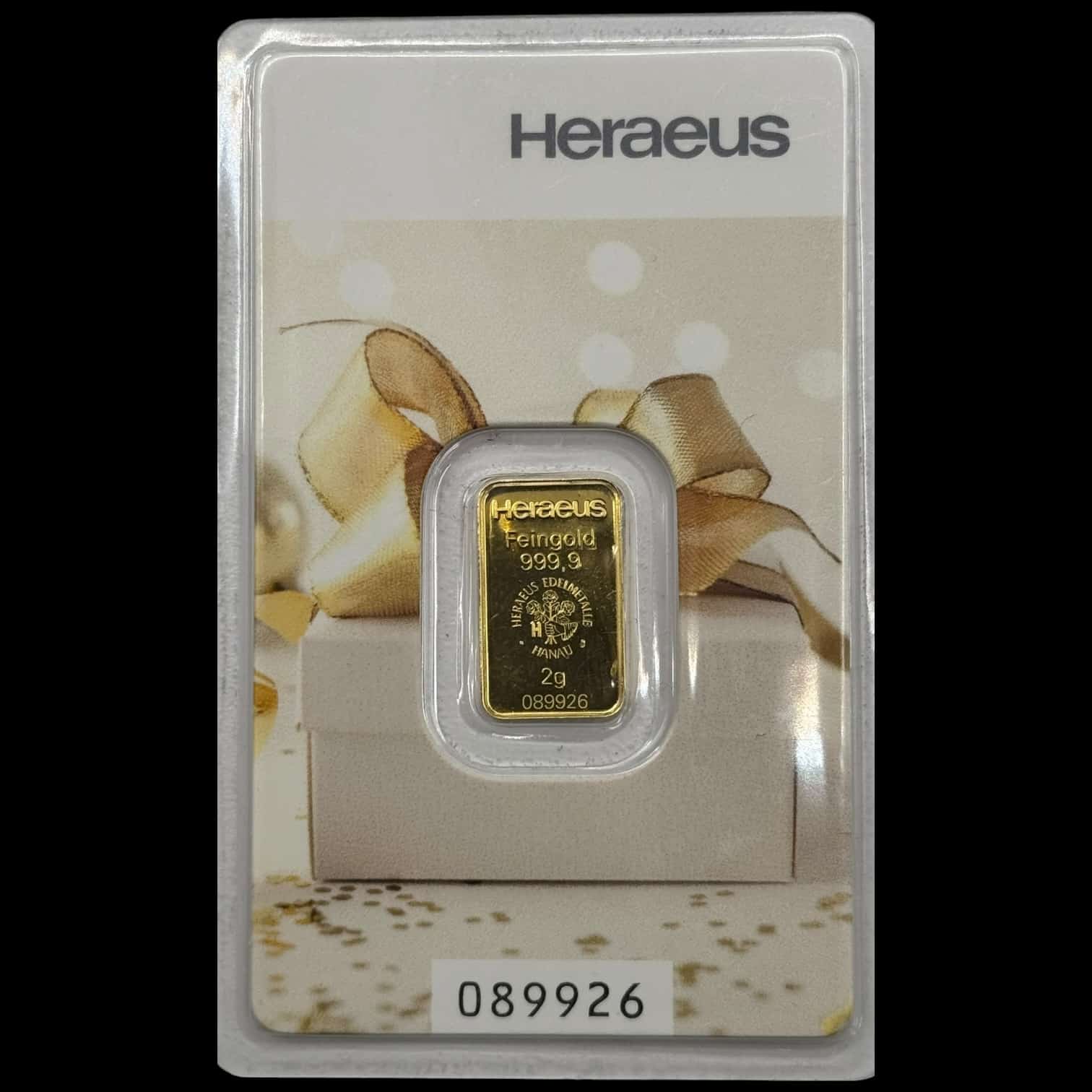 Guldbar, 2 gram, Heraeus, motiv "gave", orginal holder