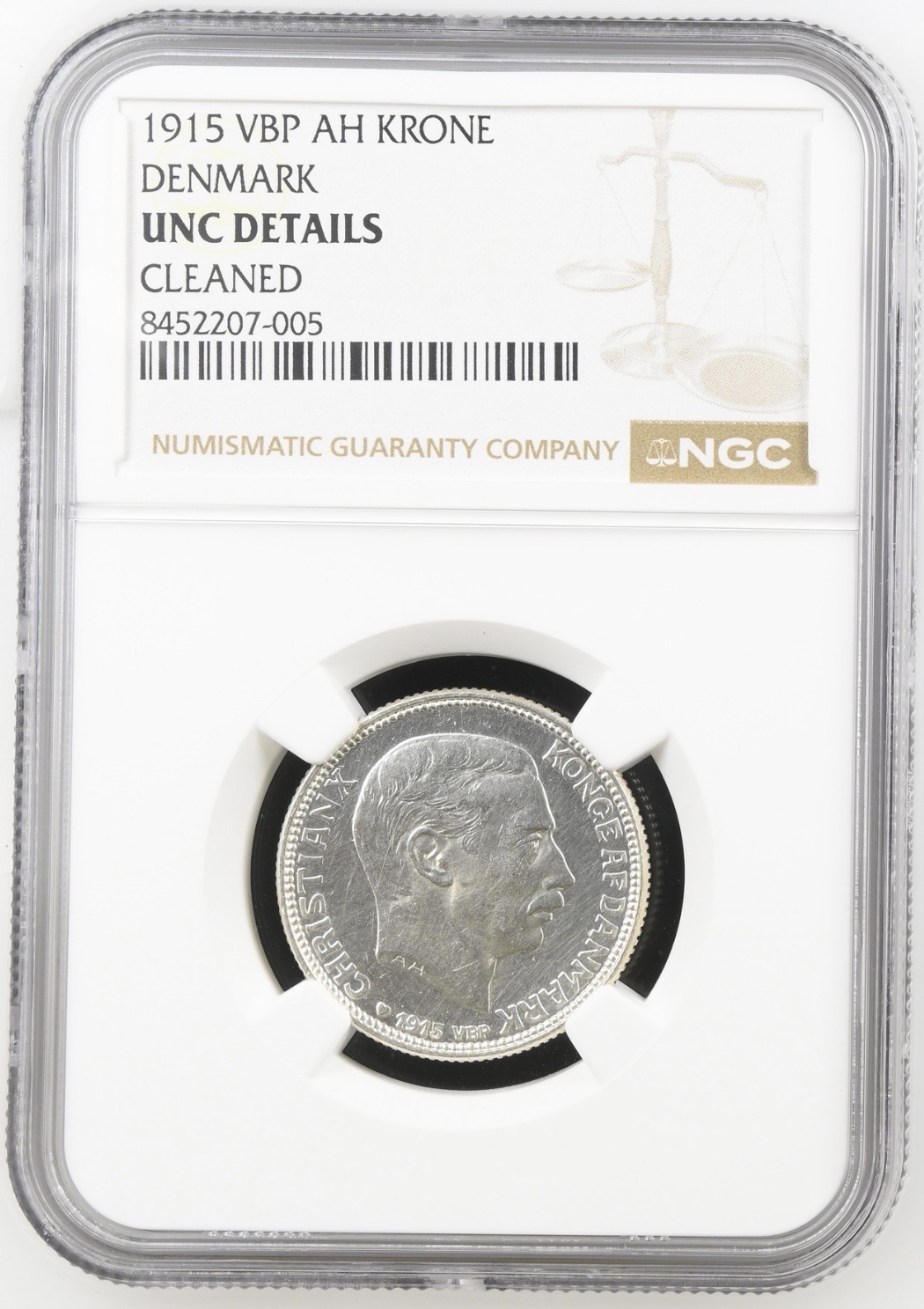 1915, 1 krone, Chr.X, Sieg 2, Hede 9, Kva. 0-M "Svag renset", Graderet UNC Details Cleaned af NGC